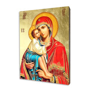 Eleusa Mother of God religious icon on a hand-gilded wood panel