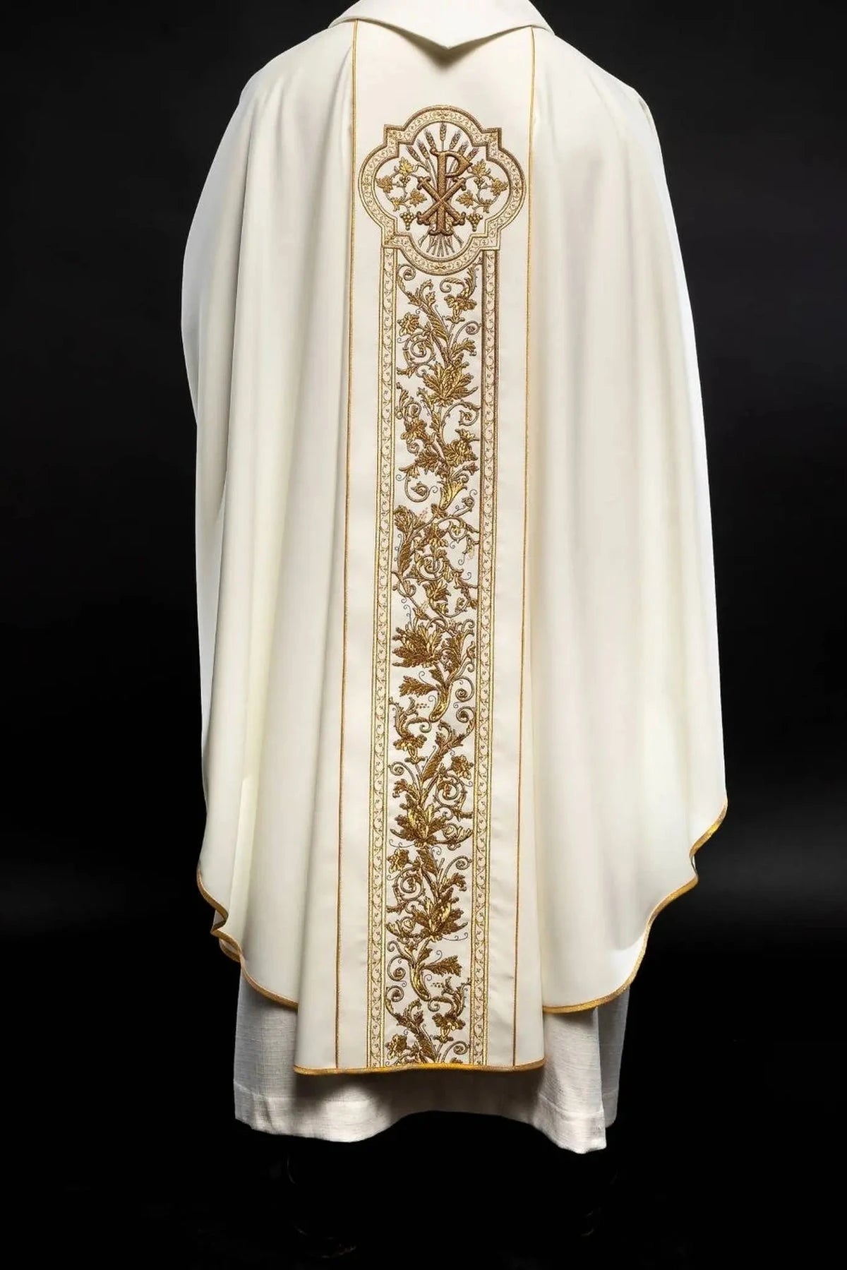 Full back embroidery with Christogram on an ecru chasuble