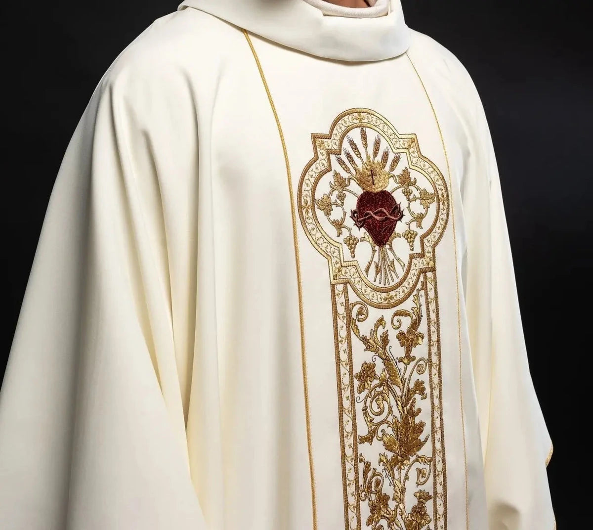 Sacred Heart medallion and botanical embroidery on an ecru chasuble