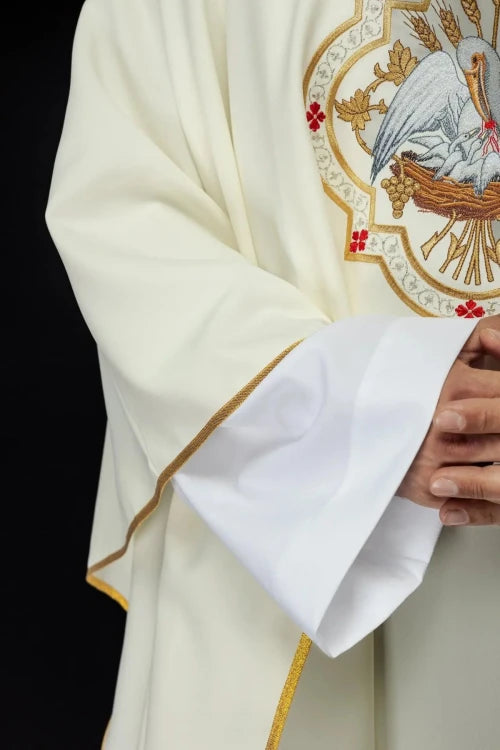 Ecru Chasuble with embroidered pelican motif — close-up detail