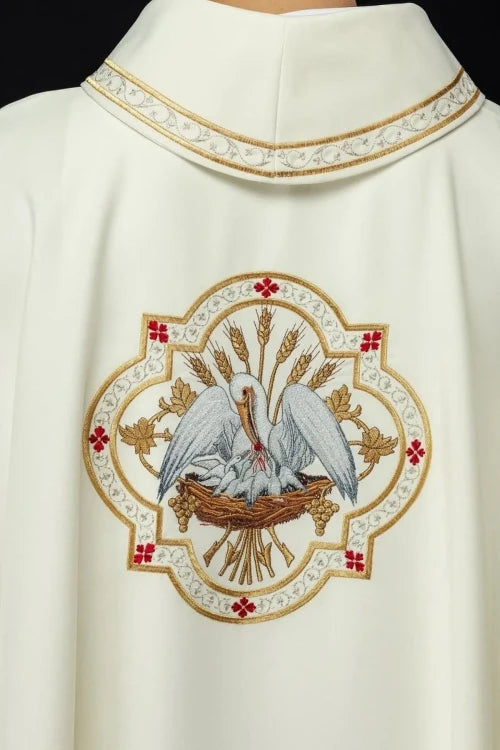 Ecru Chasuble with embroidered pelican motif — fabric detail