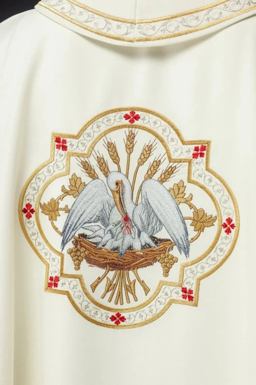 Ecru Chasuble with embroidered pelican motif — vestment detail