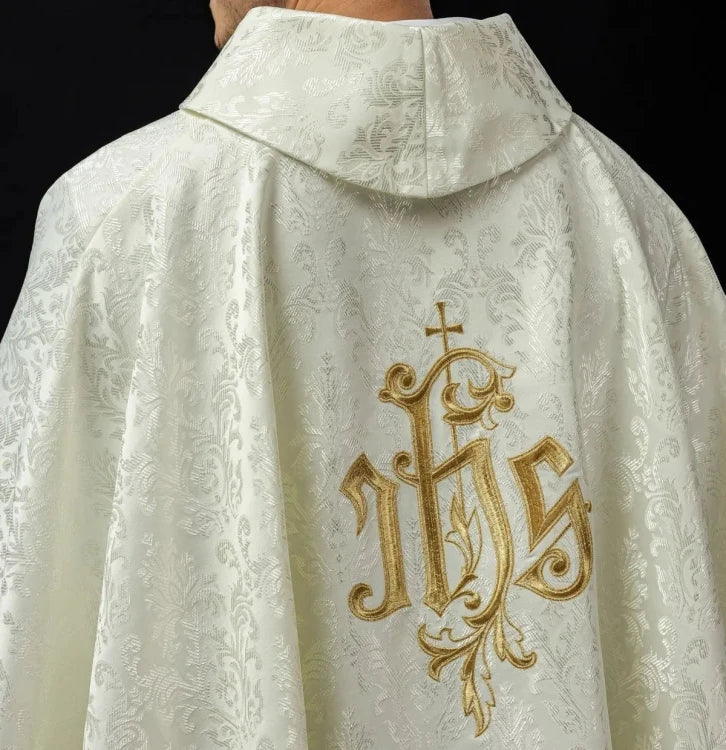 Ecru Chasuble with IHS embroidery on decorative fabric — back view