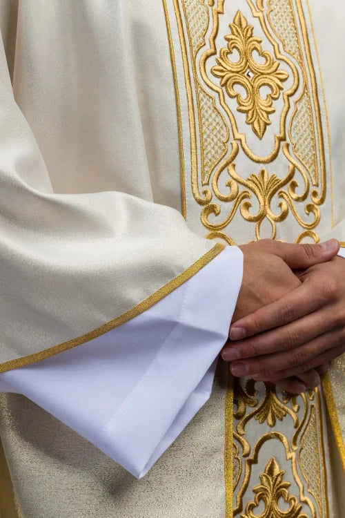 Ecru Chasuble with rich gold embroidery on a glossy band — back view