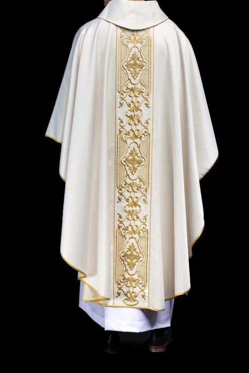 Ecru Chasuble with rich gold embroidery on a glossy band — fabric detail