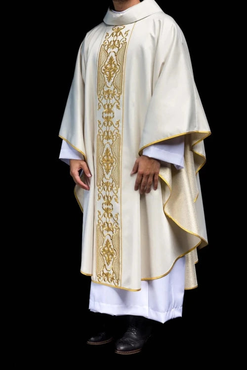 Ecru Chasuble with rich gold embroidery on a glossy band — vestment detail