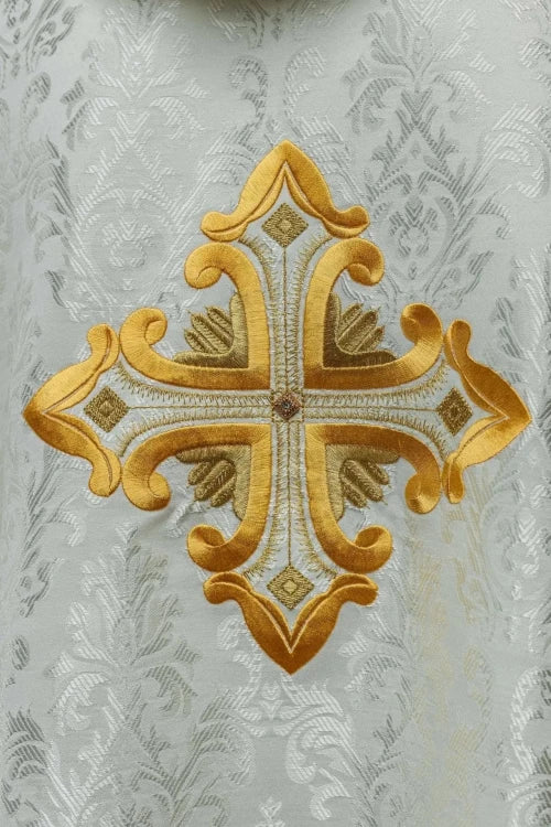 Ecru Chasuble with embroidered cross on patterned fabric — decoration detail