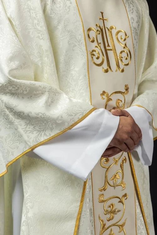 Ecru Chasuble with embroidered band with IHS monogram — back view