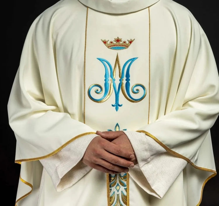 Ecru Chasuble with embroidered Marian symbol — fabric detail