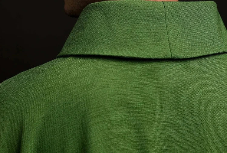 Green Chasuble with embroidered crosses — close-up detail