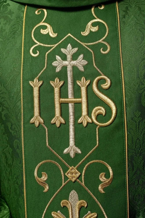 Green Chasuble with IHS embroidery on decorative fabric — decoration detail
