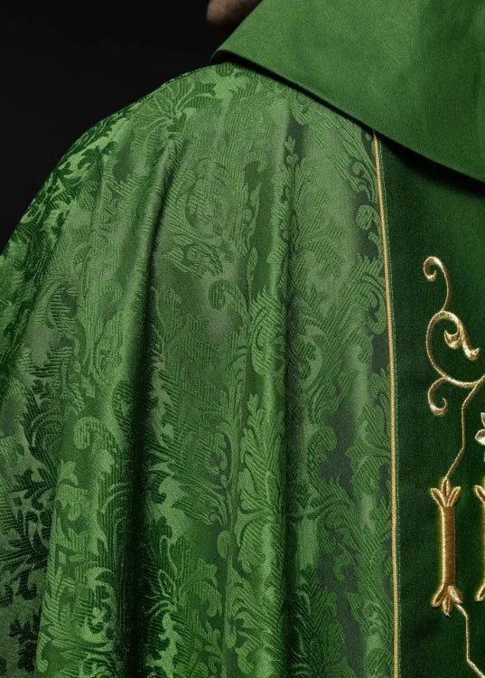 Green Chasuble with IHS embroidery on decorative fabric — collar detail