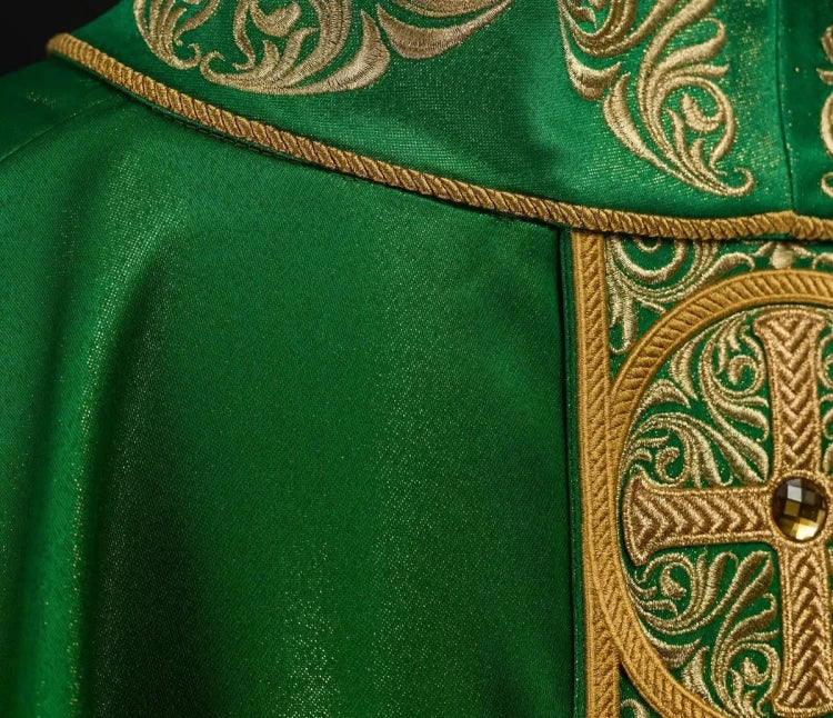 Green Chasuble with rich embroidery with decorative stones — close-up detail