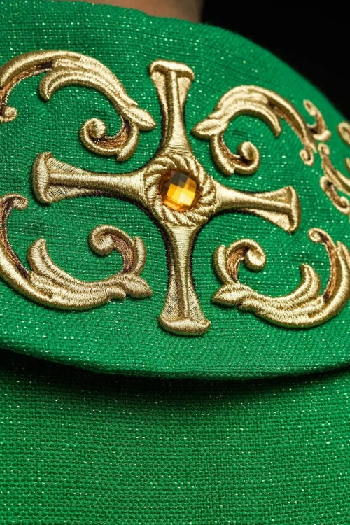 Green Chasuble with rich embroidery with decorative stones — close-up detail