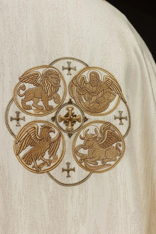 Ecru Chasuble with embroidered symbols of the Four Evangelists — fabric detail