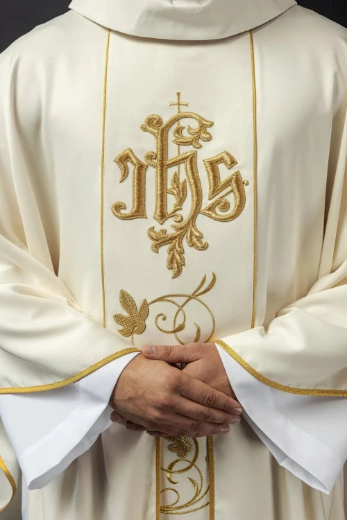 Ecru Chasuble with embroidered band with IHS and floral motif — back view