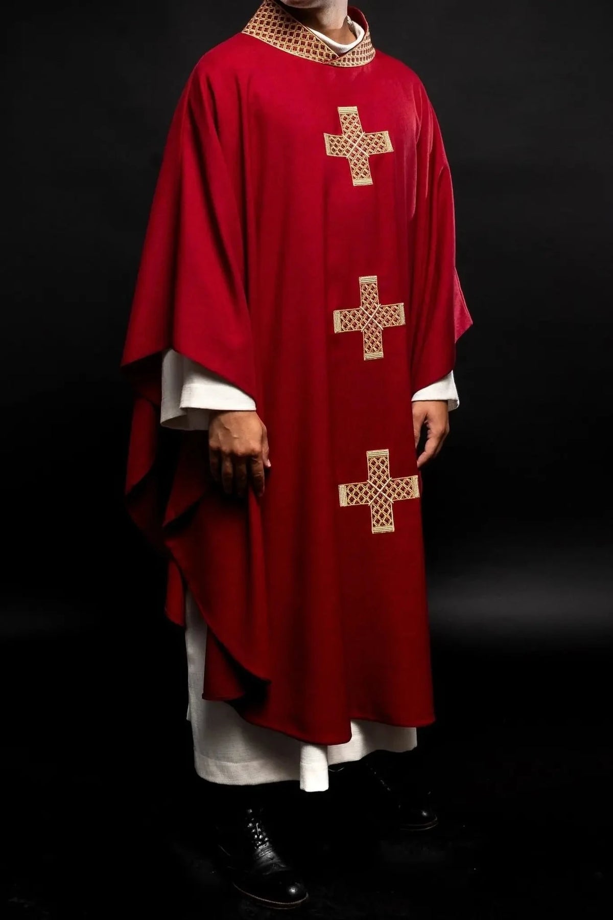 Red chasuble with gold cross embroidery — full view