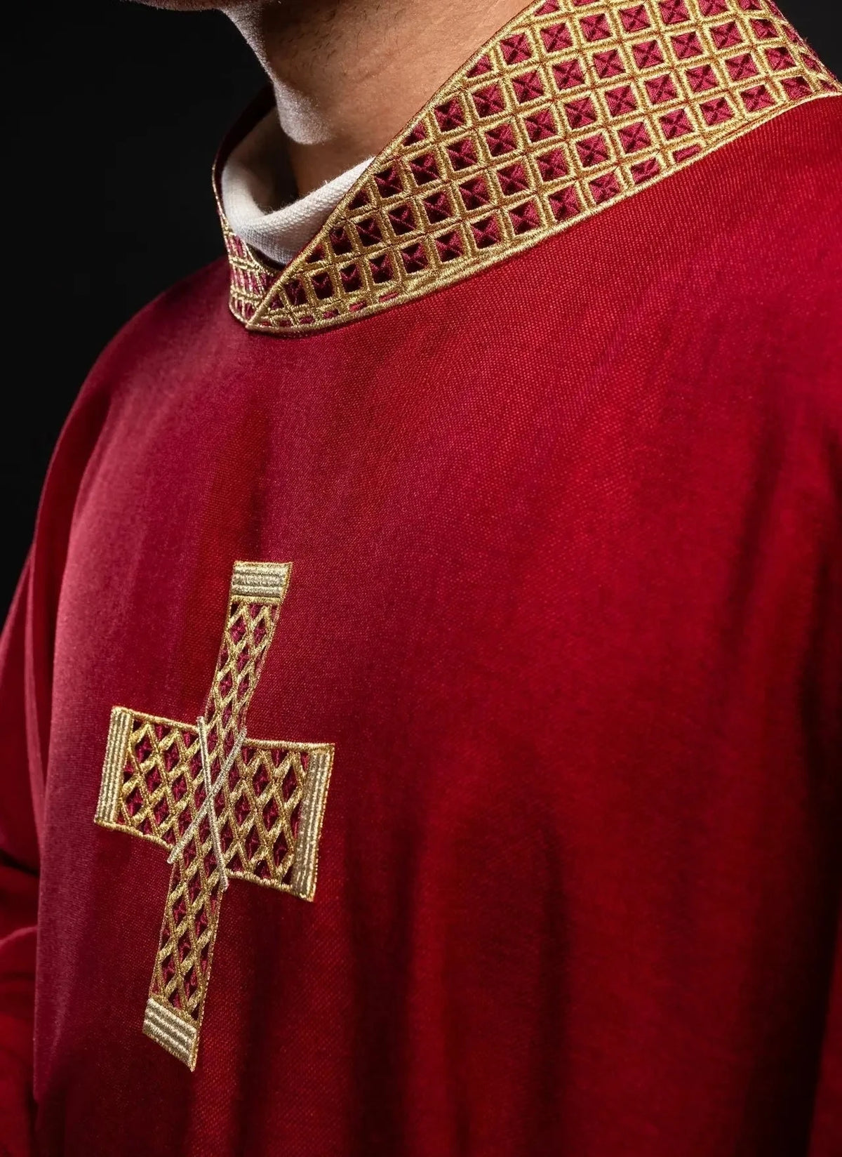 Red chasuble with gold cross embroidery — cross detail