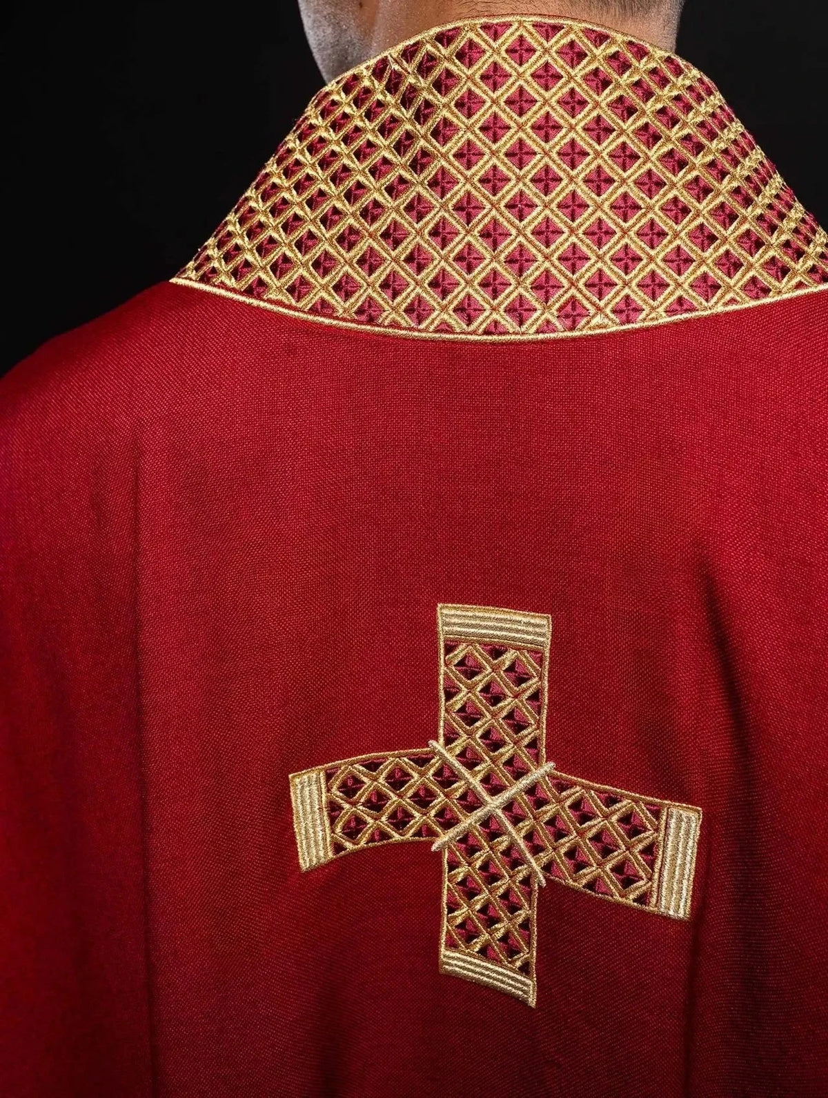 Red chasuble with gold cross embroidery — neckline finish