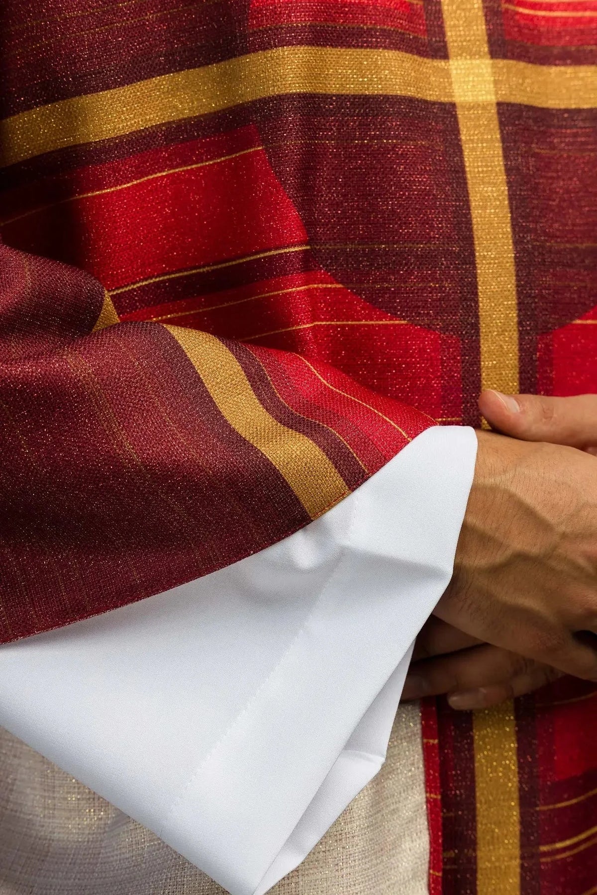Red chasuble with printed cross — cross detail