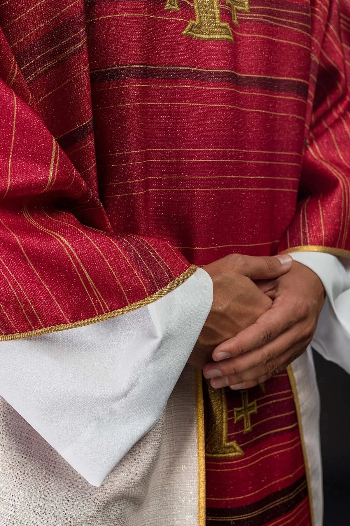 Red chasuble with printed Jerusalem Cross — symbol detail