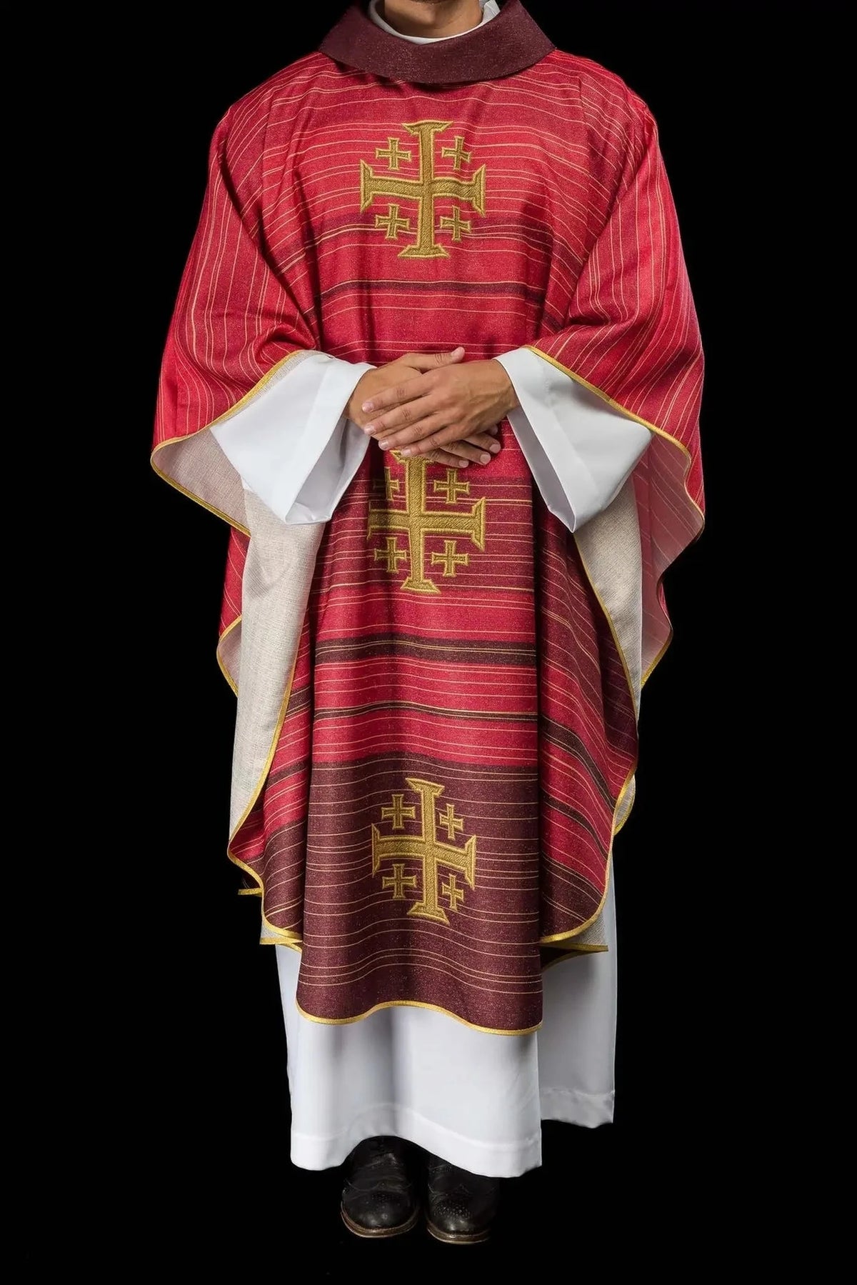 Red chasuble with printed Jerusalem Cross — surface detail