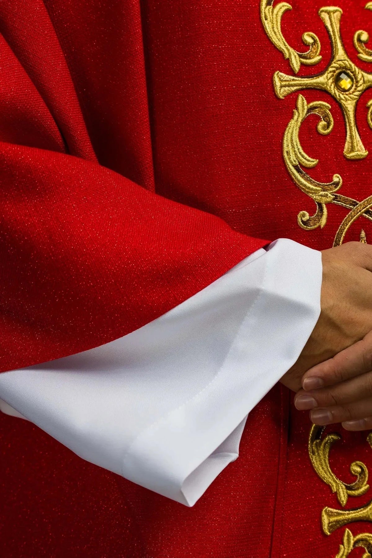 Richly Embroidered Red Chasuble with Decorative Stones — symbol detail