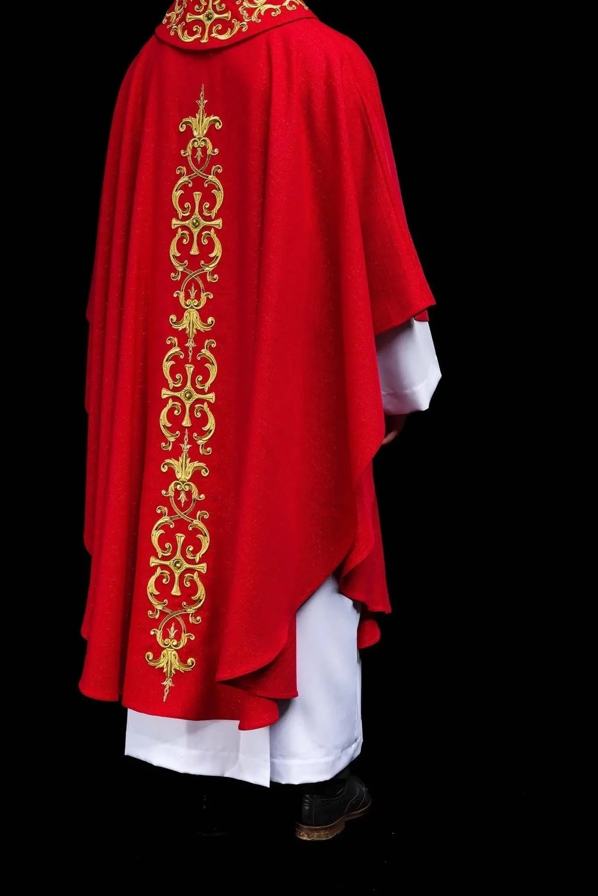 Richly Embroidered Red Chasuble with Decorative Stones — fabric detail