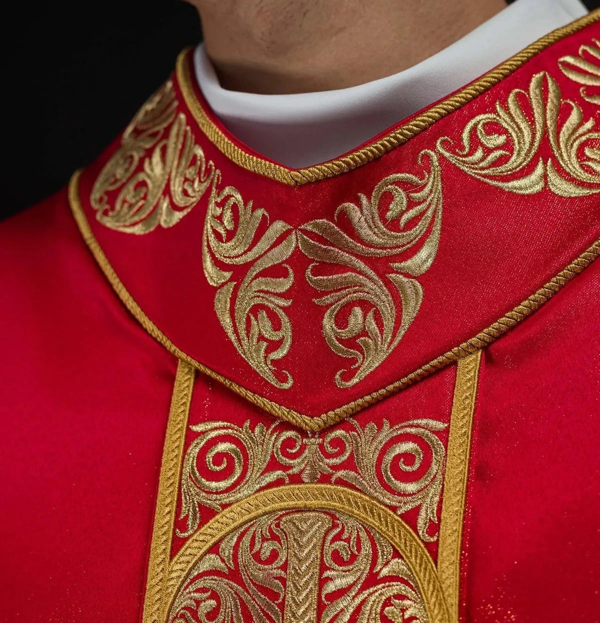Red Chasuble with Rich Embroidery and Decorative Stones — front view
